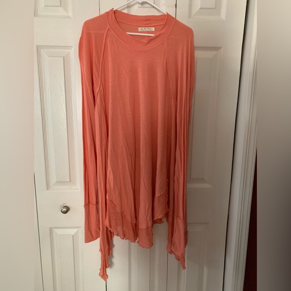 We The Free Tops - We The Free pull over shark bite hem top. Orange cream color. EUC XL.